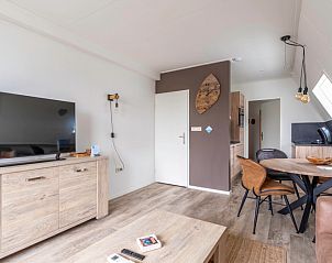 Stylish dining room and kitchen in Apartment Anna 222, De Koog, Texel, perfect for cozy meals during your stay.