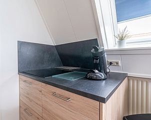 Compact kitchen in Apartment Anna 222, De Koog, Texel, equipped with modern appliances for a comfortable stay.