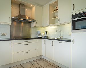 Fully equipped kitchen in Villa 6 persons, De Koog, Texel. Modern facilities for a comfortable stay on the Wadden Islands.