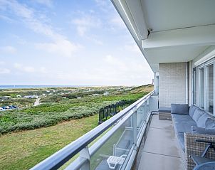 Balkon des Appartements Juliana 102 Zeezicht, De Koog, Texel mit Panoramablick auf die Watteninseln.
