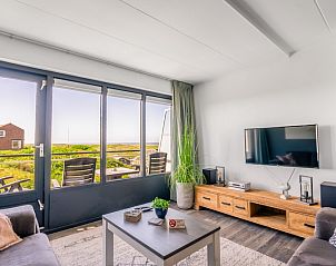 Bright living room of Apartment Juliana 094 Island and Sea View in De Koog, Texel overlooking the Wadden Sea.