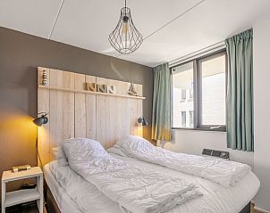 Bedroom with double bed in Apartment Juliana 094 Island and Sea View, De Koog, Texel.