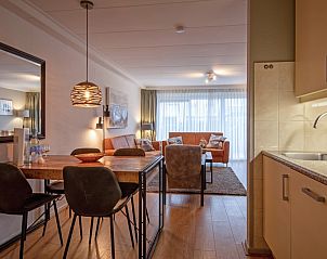 Offene Kche und Essbereich in Apartments Anna - Dageraad, De Koog, Texel mit moderner Einrichtung und viel Komfort.