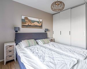 Slaapkamer met comfortabel bed in Appartement Juliana 118 Zeezicht, De Koog, Texel.