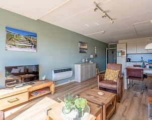 Modern living room with television in Apartment Juliana 098 Island and Sea View, De Koog, Texel, ideal for relaxation.