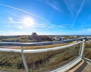 Breathtaking view from the balcony of Apartment Juliana 098 Island and Sea View, De Koog, Texel over the dunes and sea.