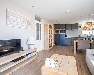 Modern kitchen and dining area in Apartment Juliana 034 Eilandzicht, De Koog, Texel for a relaxing stay.