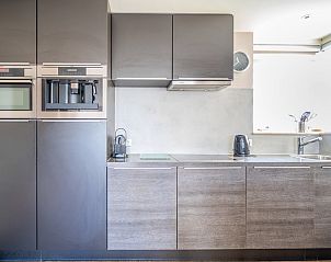 Fully equipped kitchen in Apartment Juliana 034 Eilandzicht, De Koog, Texel with modern appliances.