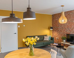 Stylish living room of Apartment 4 persons in De Koog, Texel with modern decor and cozy atmosphere.