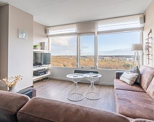 Gemtliche Sitzecke im Appartement Juliana 174 Eilandzicht, De Koog, Texel, mit Blick auf die Natur.