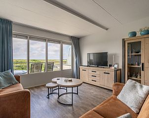 Gemtliche Sitzecke im Apartment Juliana 096 Island and Sea View, De Koog, Texel mit Blick auf die Watteninseln.