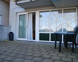 Spacious terrace of Apartment Dorpsstraat 245 in De Koog, Texel overlooking nature.