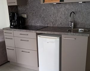 Fully equipped kitchen in Apartment Dorpsstraat 245, De Koog, Texel with modern amenities.