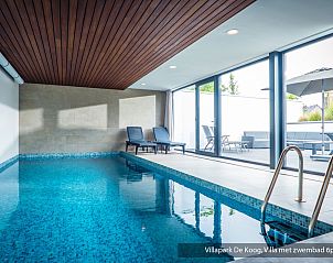 Luxury family villa with pool in De Koog, Texel. Modern architecture surrounded by lush nature on the Wadden Islands.