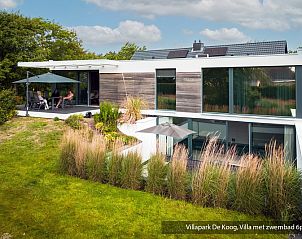 Luxury family villa with pool in De Koog, Texel. Spacious veranda for ultimate relaxation on the Wadden Islands.