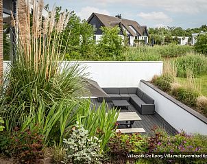 Luxury family villa with swimming pool in De Koog, Texel. Attractive sitting area for relaxation on the Wadden Islands.