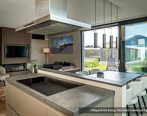 Luxury family villa with pool in De Koog, Texel. Comfortable living room with stylish interior on the Wadden Islands.