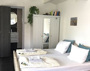 Spacious bedroom in Zomerhuisje Schoo, De Koog, Texel, vacation home on the Wadden Islands.