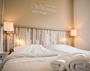 Attractive bedroom in Villa 3, De Koog Texel, vacation home with comfortable beds.