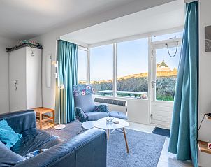 Bright interior space of Apartment Juliana 068 Island and Sea View, De Koog, Texel with comfortable seating.
