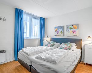 Gemtliches Schlafzimmer mit zwei Einzelbetten in Appartement Juliana 052 Eiland en Zeezicht, De Koog, Texel.