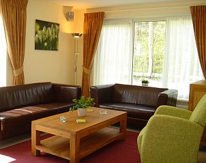 Cozy living room in 6-person vacation home with sauna, De Koog, Texel