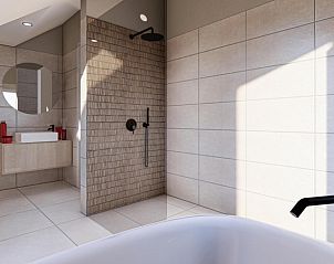 Modern bathroom in Duinvilla Wellness 4, vacation home in De Koog, Texel with luxury shower and bath.