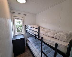 Cozy bedroom with bunk beds in Chaletpark Bregkoog - Chalet 240 De Texelse Berg, De Koog, Texel.