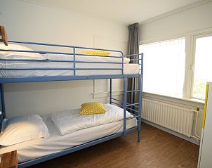 Cozy children's room with bunk beds in Grand Hotel Opduin - Holiday home A, De Koog, Texel, perfect for families on the Wadden Islands.