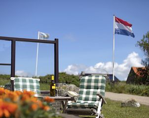 Outdoor terrace overlooking the surroundings of Grand Hotel Opduin - Holiday home A, De Koog, Texel in the Wadden Islands.