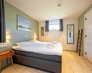 Komfortables Schlafzimmer im Ferienhaus Dennenbries, De Koog, Texel mit gemtlicher Atmosphre.