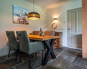 Modern kitchen in Holiday home in De Koog, Texel, with wooden finish.