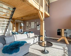 Modern living room with high ceilings in Holiday home in De Koog Texel, perfect for a luxurious stay on the Wadden Islands.