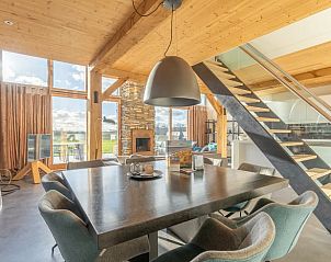 Dining area with lots of light in Holiday home in De Koog Texel, offers a beautiful view of the Wadden Islands.