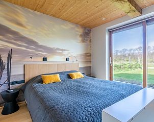 Bedroom with panoramic view in Holiday home in De Koog Texel, offers a serene atmosphere on the Wadden Islands.