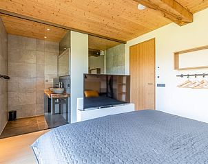 Luxury bedroom with ensuite bathroom in Holiday home in De Koog Texel, for ultimate comfort on the Wadden Islands.