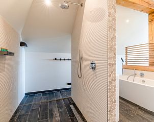 Luxury walk-in shower in Holiday home in De Koog Texel, ideal for a refreshing experience on the Wadden Islands.