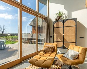 Comfortable lounge chairs at Holiday home in De Koog, Texel, Wadden Islands.
