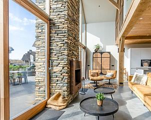 Bright living room overlooking the garden in Holiday home in De Koog, Texel.