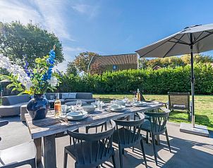 Outdoor dining on the terrace of Holiday home in De Koog, Texel, Wadden Islands.