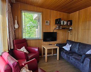 Bright living room with TV in Bungalowpark De Nagtegaal - Bungalow 47, De Koog, Texel.