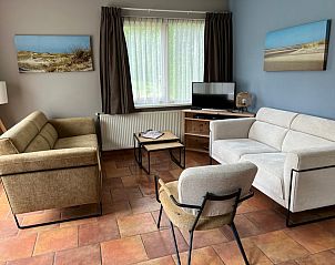 Cozy living room in Landgoed Springtij - Koetshuis 1, vacation home in De Koog, Texel.