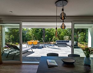 Modern kitchen of Holiday home in Den Burg, Texel, with wooden finish.