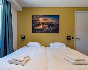 Cozy bedroom under the roof of Holiday Home in Den Burg, Texel.