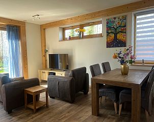 Cozy living room in Hoeve Consensus Texel vacation home in Den Burg with comfortable seating