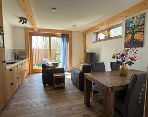 Open kitchen and living room in Hoeve Consensus Texel vacation home in Den Burg, Texel