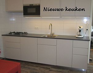 Modern kitchen in Hospitable vacation home Den Burg, Texel, ideal for culinary adventures on the Wadden Islands.