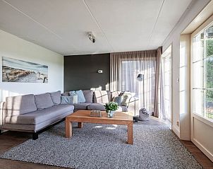 Bright sitting area in Waddenduyn vacation home, Den Burg, Texel with comfortable sofa.