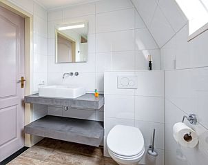 Spacious shower in Cottage in Den Burg, Texel, vacation home with modern bathroom.