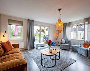 Modern living room in Holiday home in Den Burg with comfortable seating, Texel.